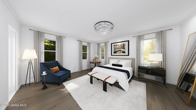 bedroom featuring dark wood-type flooring, multiple windows, and ornamental molding