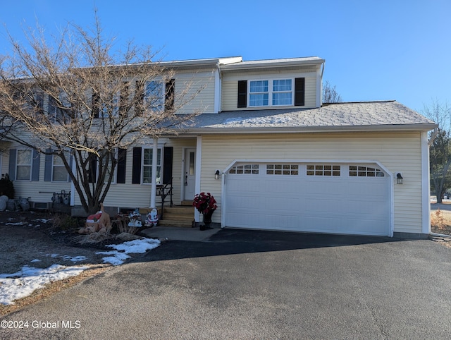 view of front of home with a garage