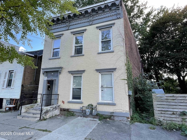 italianate house with a patio