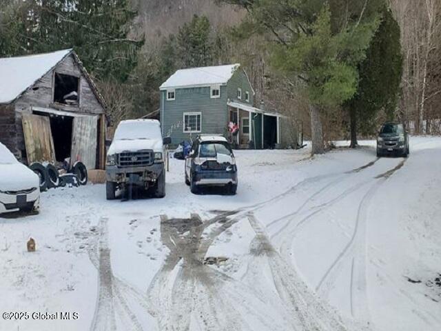 view of yard covered in snow