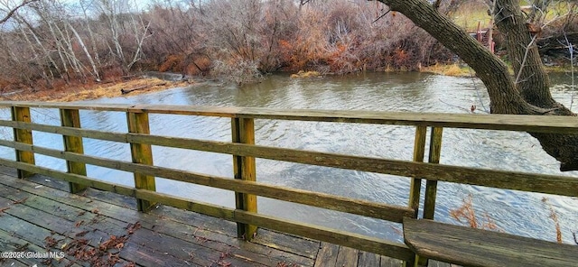 view of dock with a water view