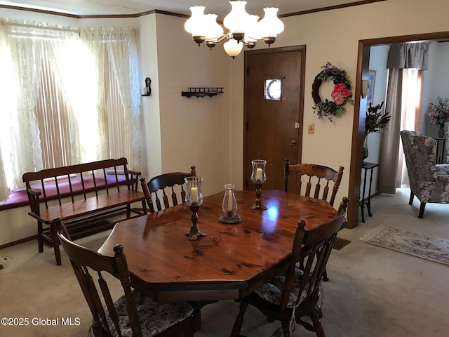 24 4th Ave, Gloversville, NY 12078 - dining room with a chandelier, carpet flooring, and crown molding