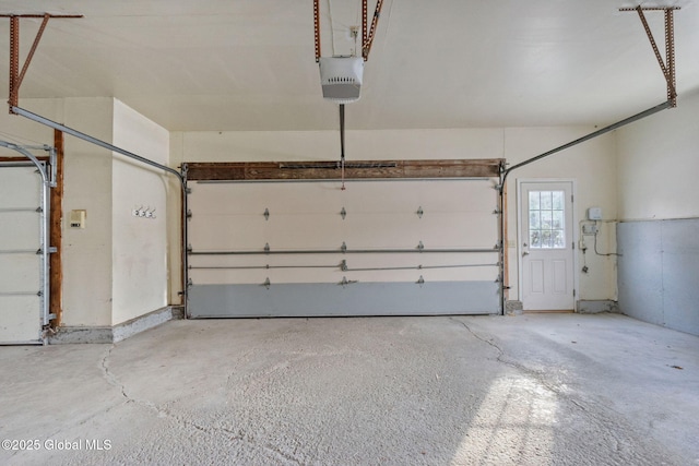 garage featuring a garage door opener