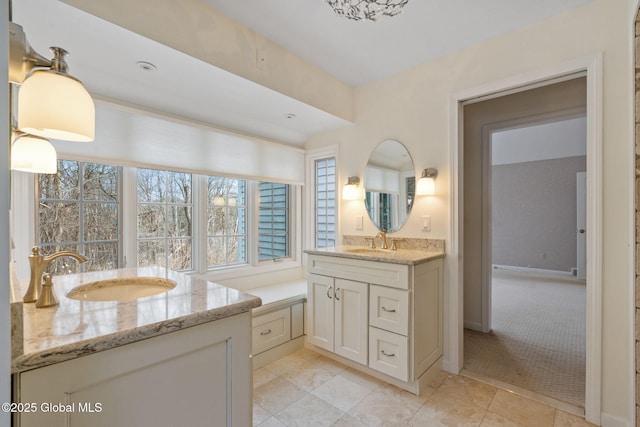 bathroom featuring tile patterned floors and vanity