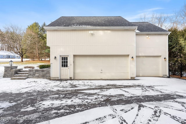 view of snow covered garage