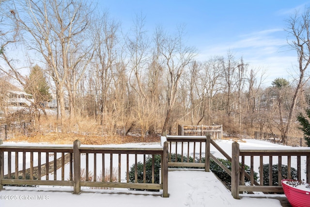 view of snow covered deck