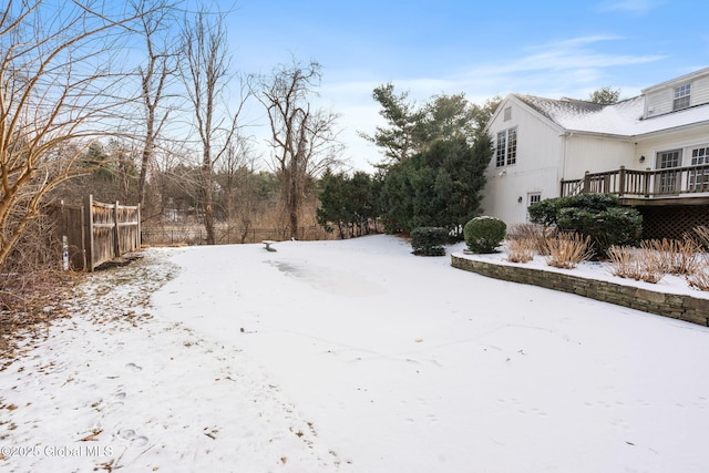 view of yard covered in snow