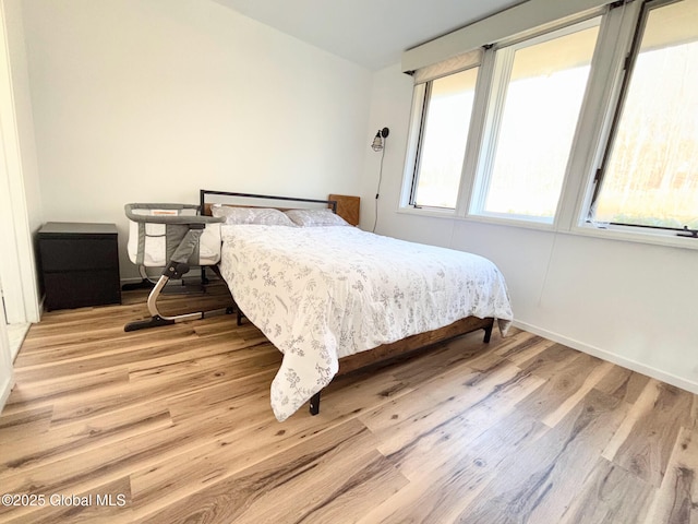 bedroom featuring light hardwood / wood-style flooring