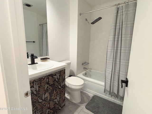 full bathroom with toilet, shower / tub combo with curtain, and sink