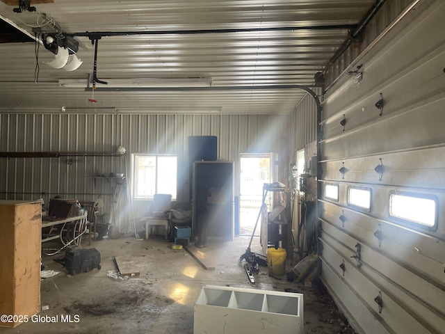 garage featuring a garage door opener