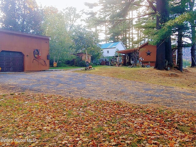 view of yard featuring a garage