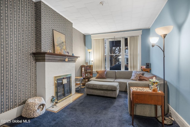 carpeted living room with a fireplace and crown molding