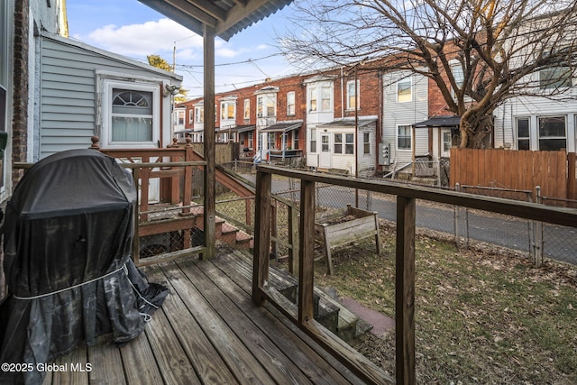 wooden deck with grilling area