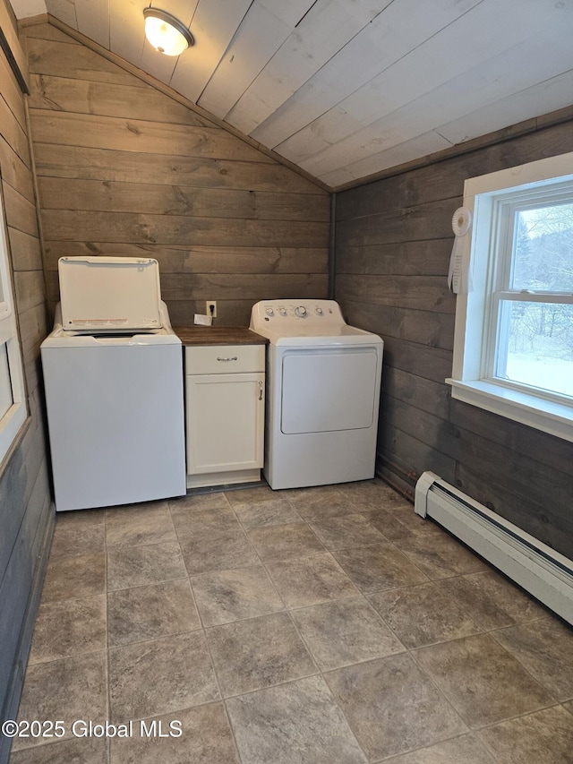 washroom featuring independent washer and dryer, wooden ceiling, wooden walls, and a baseboard heating unit