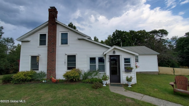 view of front of property with a front lawn