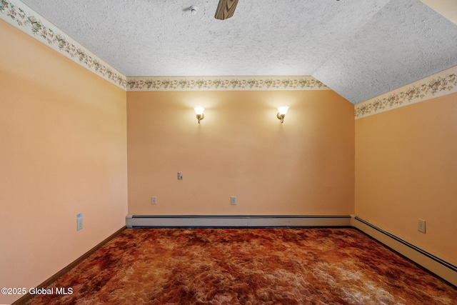 carpeted spare room with lofted ceiling, a baseboard heating unit, and a textured ceiling