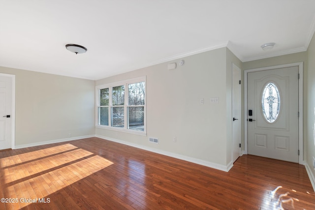 entrance foyer featuring hardwood / wood-style flooring and ornamental molding