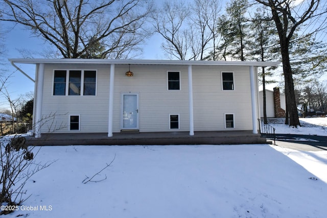 view of snow covered property