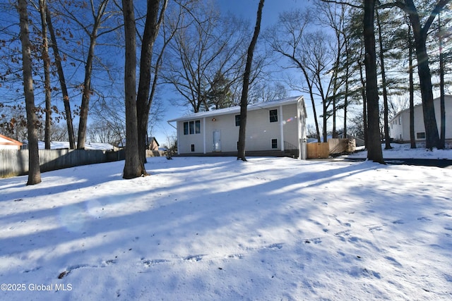 view of snow covered house