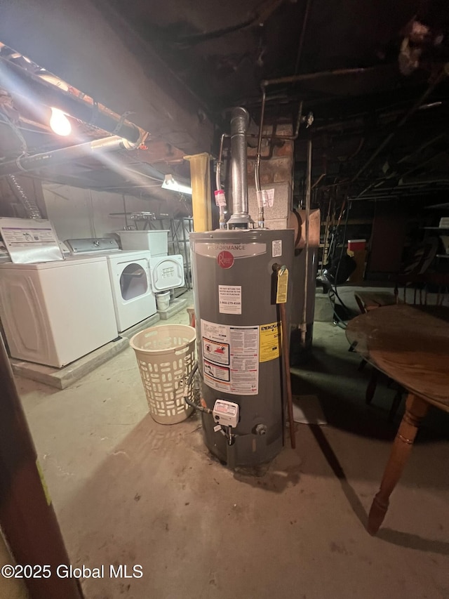 basement featuring gas water heater and independent washer and dryer