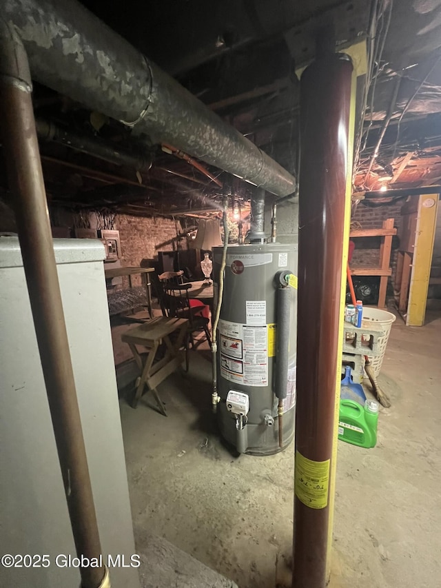 utility room featuring water heater