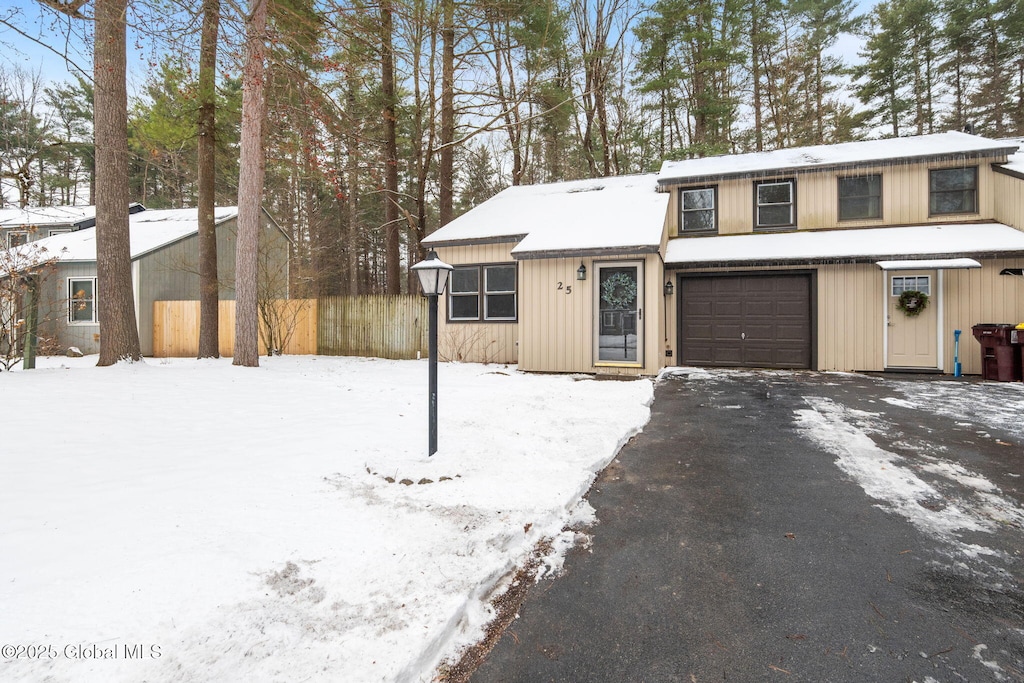 view of front of property with a garage