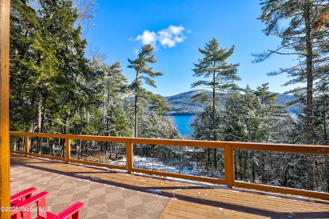 deck featuring a water and mountain view