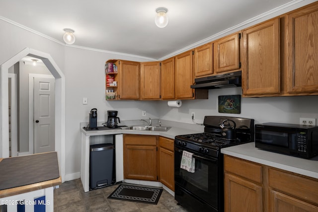 kitchen with crown molding, sink, and black appliances