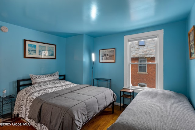 bedroom featuring hardwood / wood-style floors