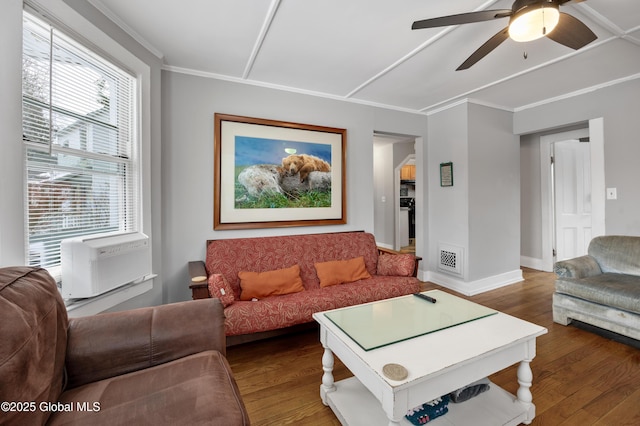 living room featuring ceiling fan, plenty of natural light, cooling unit, and hardwood / wood-style floors