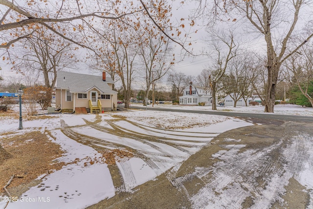 view of yard covered in snow