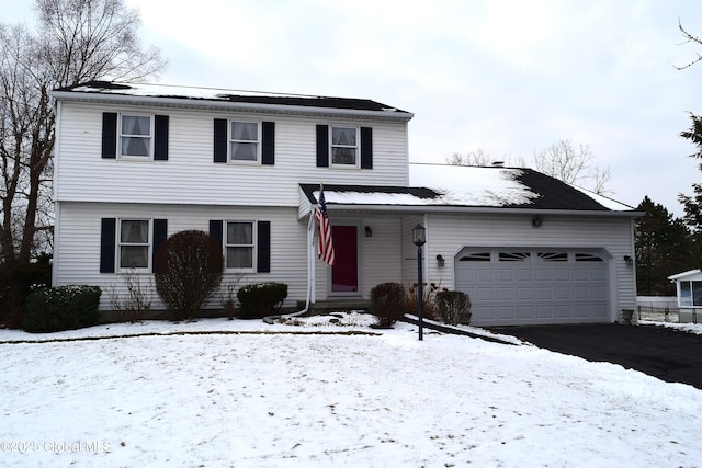 front facade with a garage