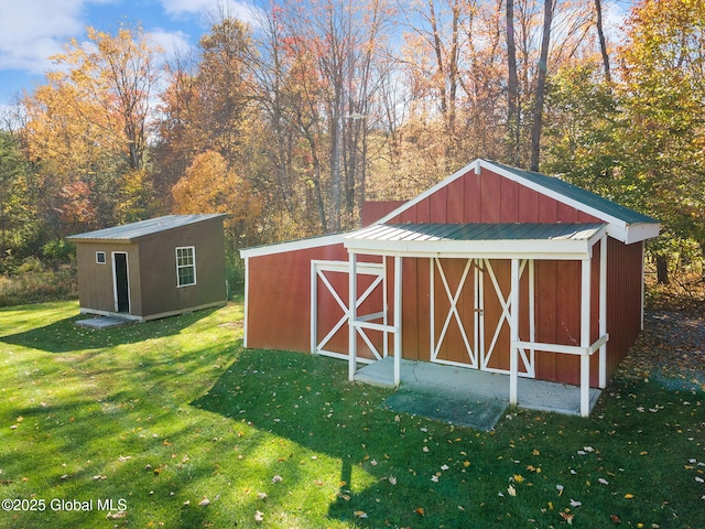 view of outbuilding with a lawn