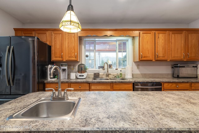 kitchen featuring hanging light fixtures, sink, black dishwasher, and fridge with ice dispenser