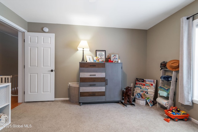 interior space featuring light carpet