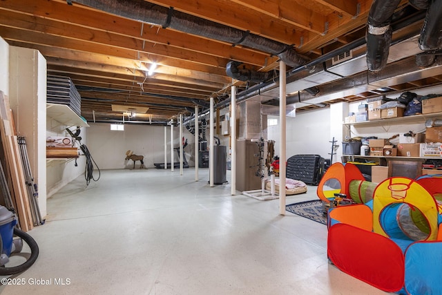 basement featuring gas water heater