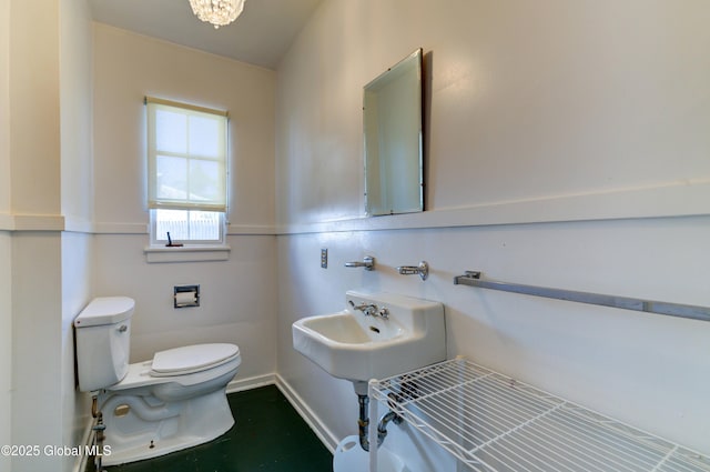 bathroom with toilet and sink