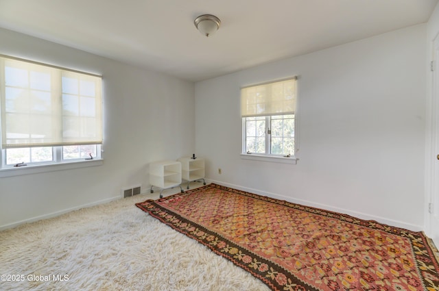 empty room featuring carpet floors