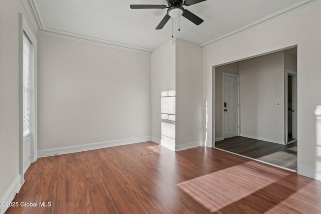 unfurnished room featuring ceiling fan, crown molding, and dark hardwood / wood-style flooring