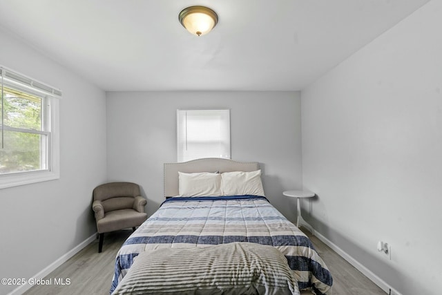 bedroom featuring light hardwood / wood-style floors