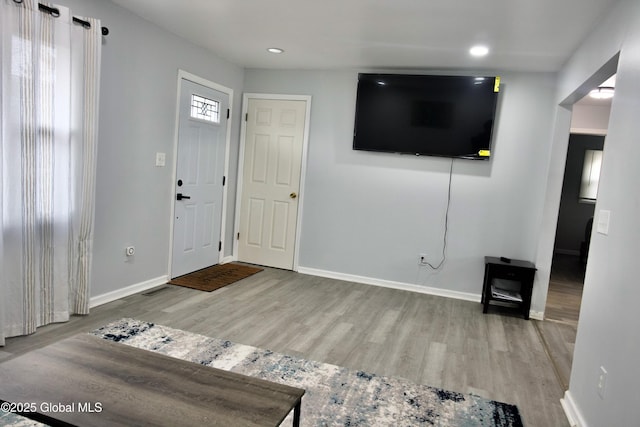 entrance foyer with a healthy amount of sunlight and light wood-type flooring