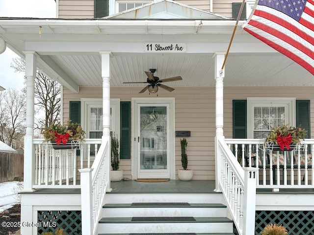 property entrance with covered porch and ceiling fan