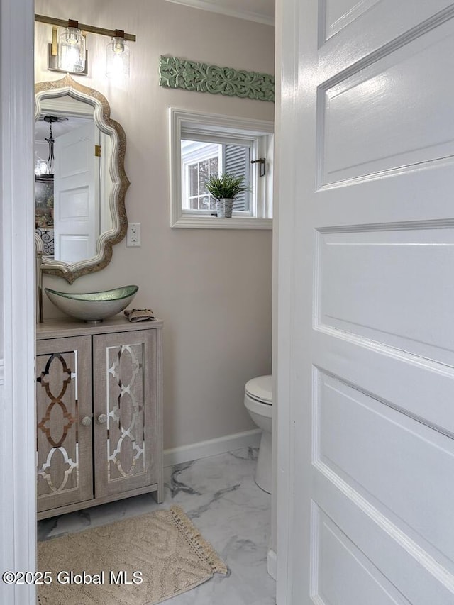 bathroom with vanity and toilet