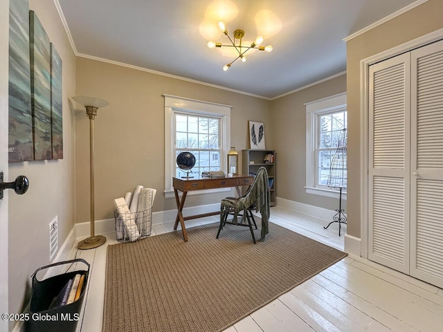 office space featuring an inviting chandelier, ornamental molding, and light hardwood / wood-style floors