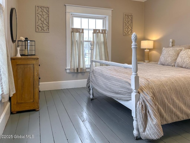 bedroom featuring wood-type flooring