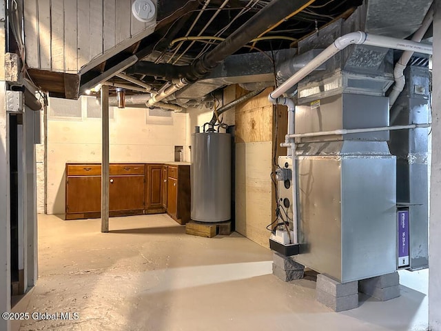 basement with water heater and heating unit