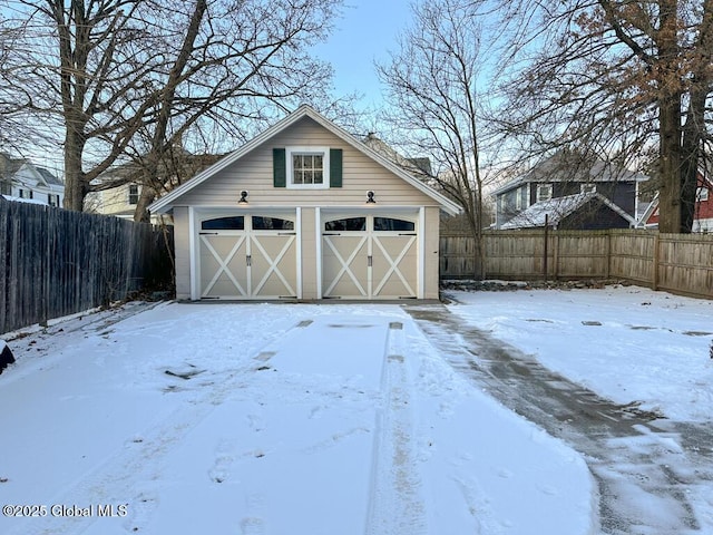 view of snow covered garage