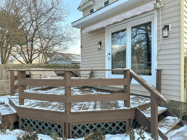 view of snow covered deck