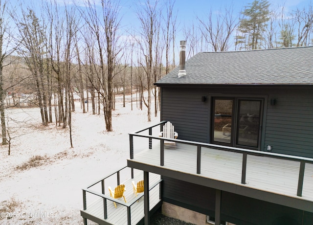 view of snow covered deck