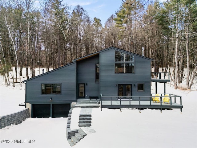 view of snow covered house